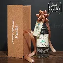 Engraved text on liquor bottle .webp